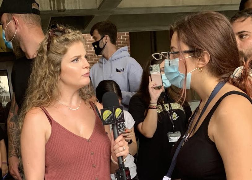 Kaitlin Bennett engaging with a student